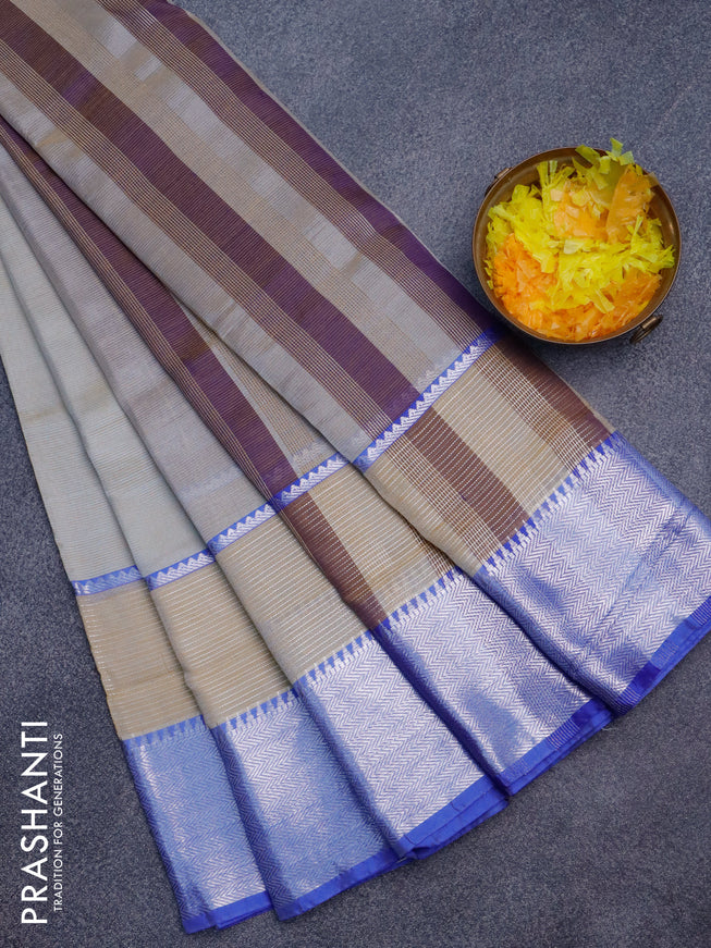 Semi mangalgiri silk saree dual shade of teal and blue with plain body and long silver zari woven border