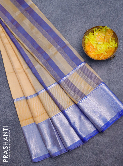 Semi mangalgiri silk saree pale orange and blue with plain body and long silver zari woven border