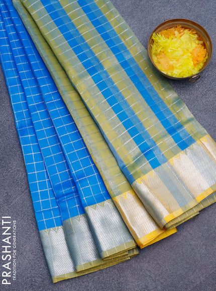 Semi mangalgiri silk saree blue and dual shade of yellow with allover silver zari checked pattern and silver zari woven border