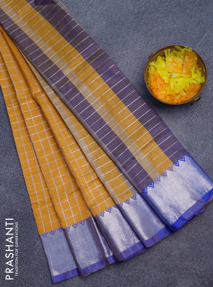 Semi mangalgiri silk saree mustard shade and blue with allover silver zari checked pattern and silver zari woven border