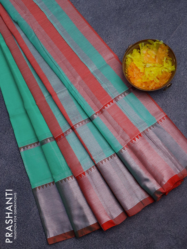 Semi mangalgiri silk saree teal green and red with plain body and silver zari woven border