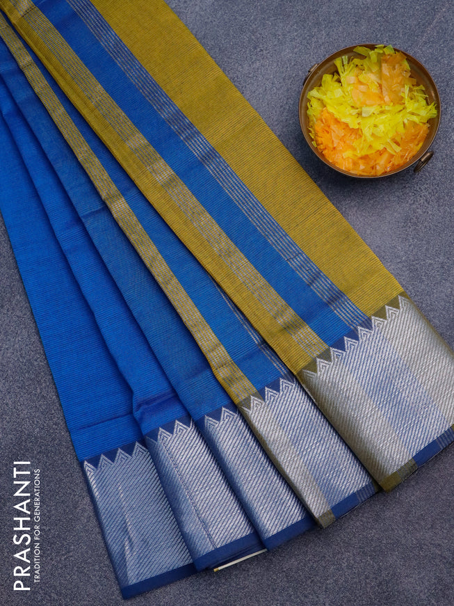 Semi mangalgiri silk saree cs blue and mustard shade with plain body and silver zari woven border