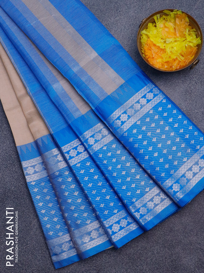 Semi mangalgiri silk saree sandal and blue with plain body and long temple design silver zari woven border