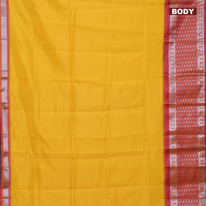 Semi mangalgiri silk saree yellow and pink with plain body and long temple design silver zari woven border