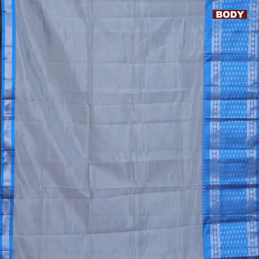 Semi mangalgiri silk saree grey and blue with plain body and long temple design silver zari woven border