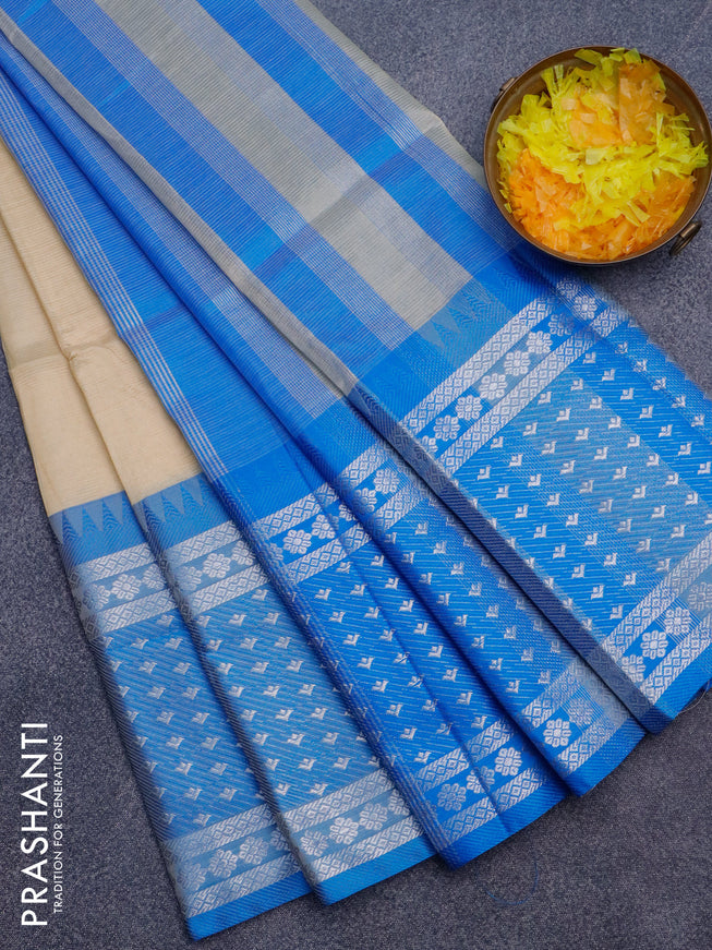 Semi mangalgiri silk saree sandal and blue with plain body and long temple design silver zari woven border