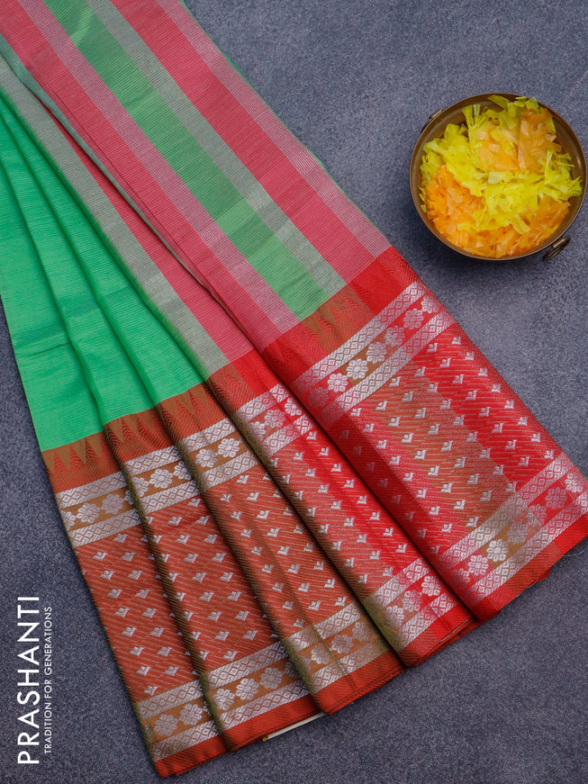 Semi mangalgiri silk saree green and dark pink with plain body and long temple design silver zari woven border