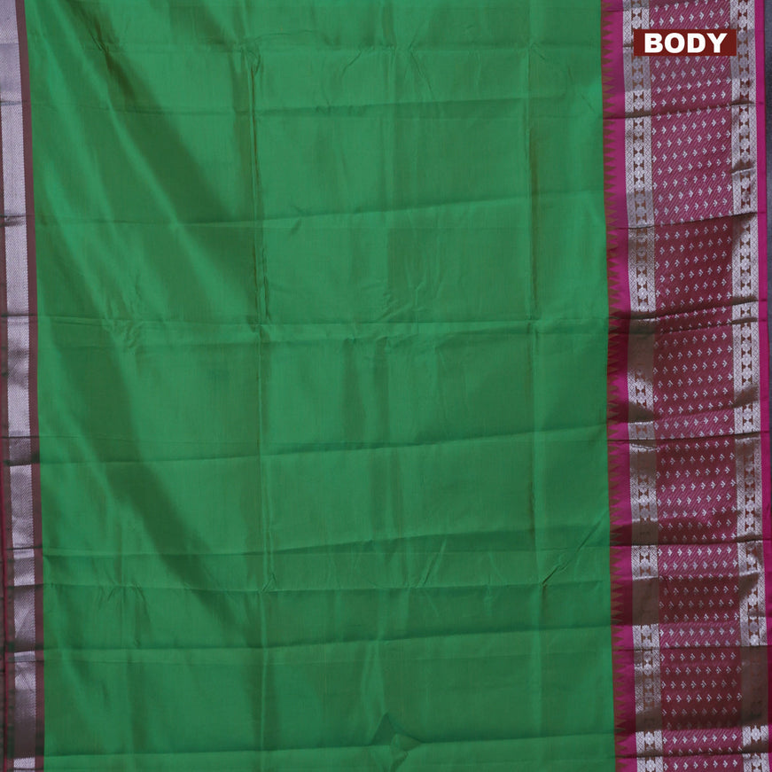 Semi mangalgiri silk saree green and pink with plain body and long temple design silver zari woven border