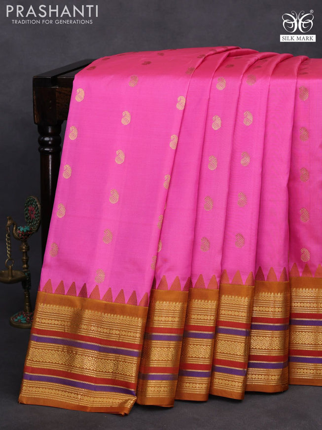 Pure gadwal silk saree light pink and mustard yellow with zari woven buttas and temple design zari woven border