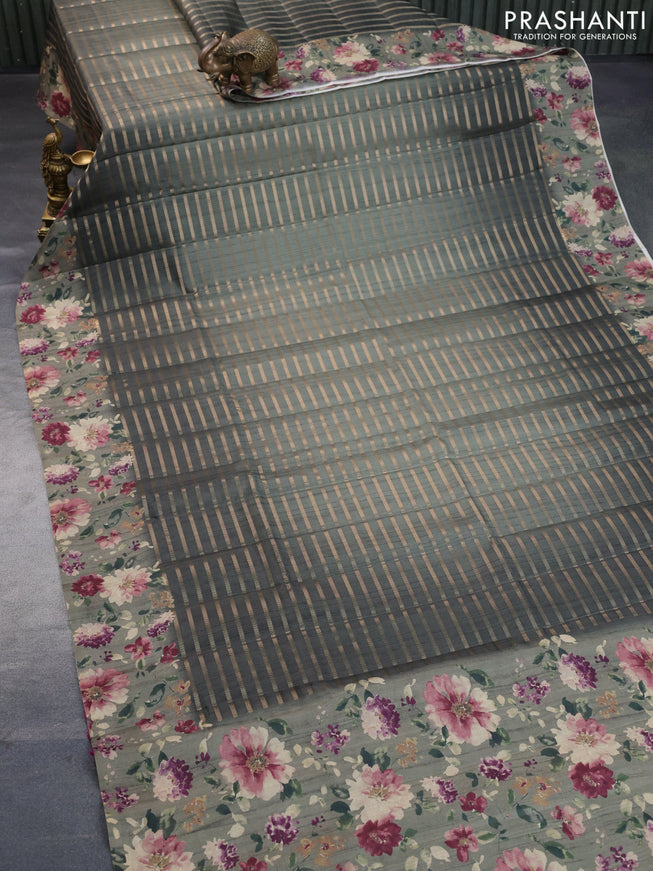 Semi tussar saree dark grey and elaichi green with allover zari weaves and floral printed border