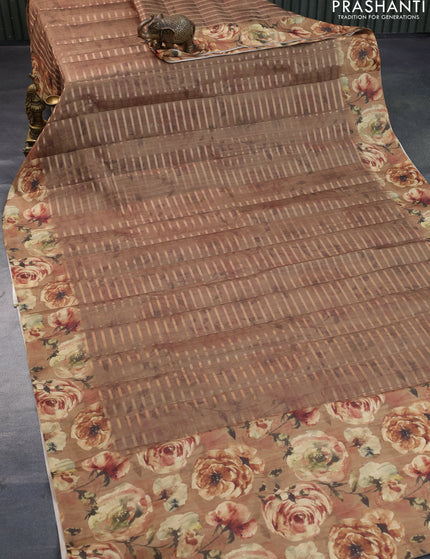 Semi tussar saree brown with allover zari weaves and floral printed border