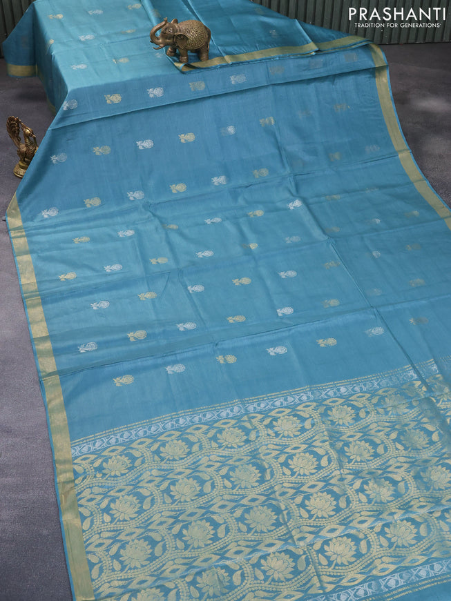 Banana silk saree teal blue with silver & gold zari weaves and zari woven border