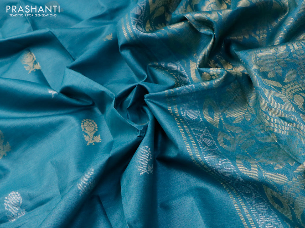 Banana silk saree teal blue with silver & gold zari weaves and zari woven border