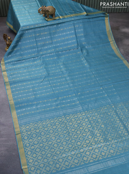 Banana silk saree teal blue with silver & gold zari woven buttas and zari woven border