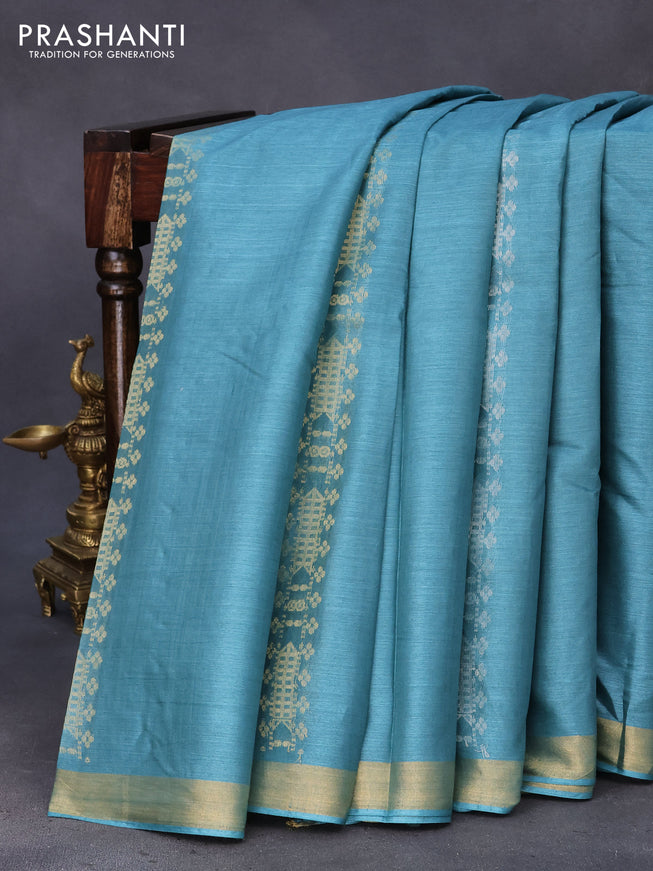 Banana silk saree teal blue with allover zari weaves and zari woven border