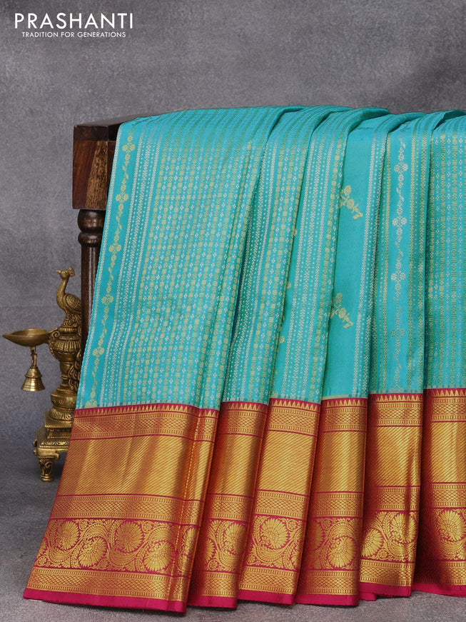 Pure kanjivaram silk saree light blue and dark magenta pink with allover silver & gold zari weaves and long zari woven floral border