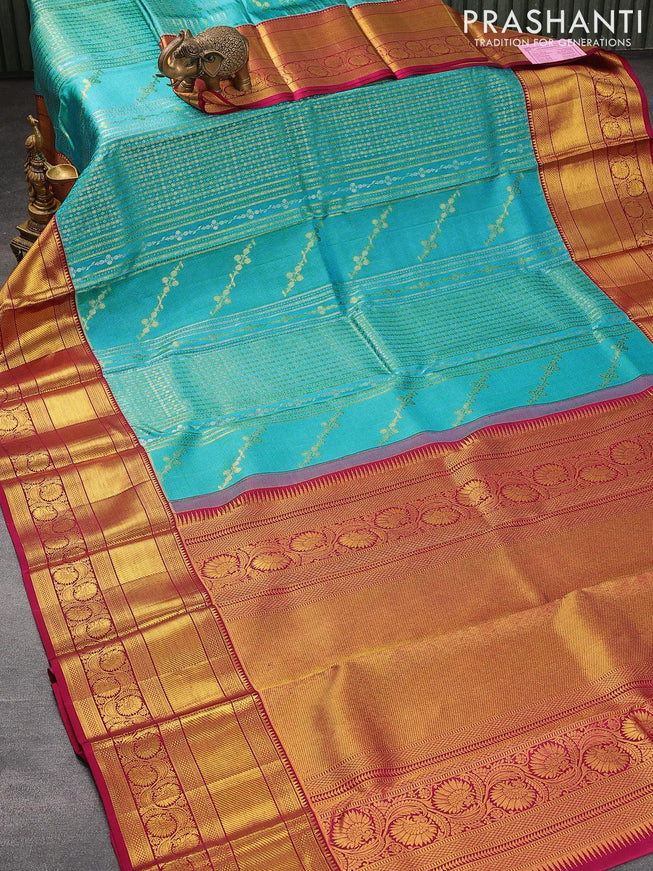 Pure kanjivaram silk saree light blue and dark magenta pink with allover silver & gold zari weaves and long zari woven floral border