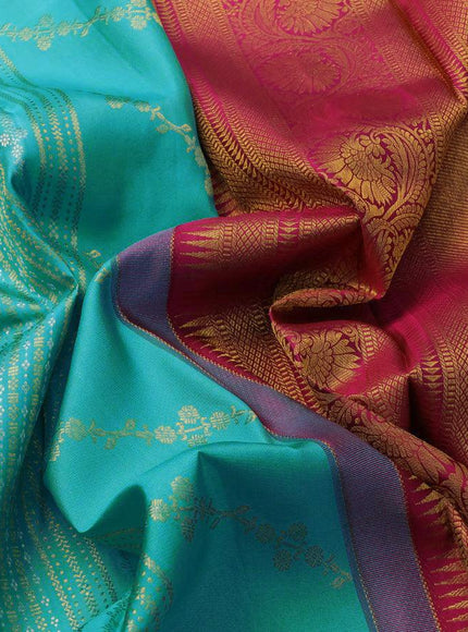 Pure kanjivaram silk saree light blue and dark magenta pink with allover silver & gold zari weaves and long zari woven floral border