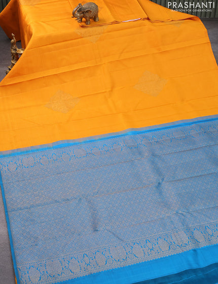 Pure kanjivaram silk saree mustard yellow and dual shade of teal bluish green with zari woven buttas in borderless style