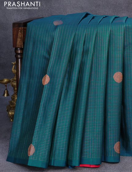 Pure kanjivaram silk saree dual shade of teal bluish green and pink with allover small zari checks & buttas in borderless style