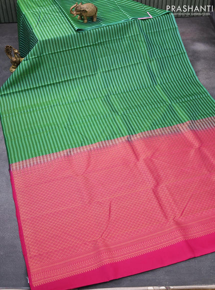 Pure kanjivaram silk saree green and pink with allover stripes & zari weaves in borderless style