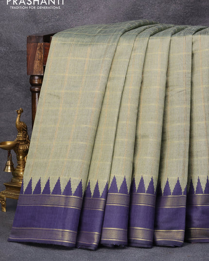 Dupion silk saree elaichi green and dark blue with allover checked pattern and temple design rettapet zari woven border