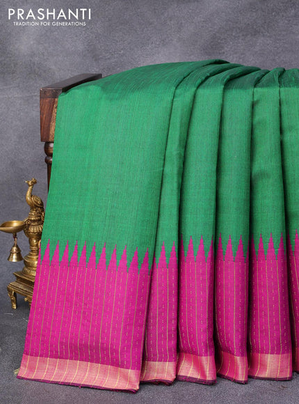 Dupion silk saree green and magenta pink with plain body and temple design zari woven border