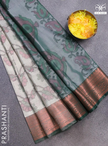 Banarasi semi tussar saree pastel grey and green with allover ikat weaves and copper zari woven border