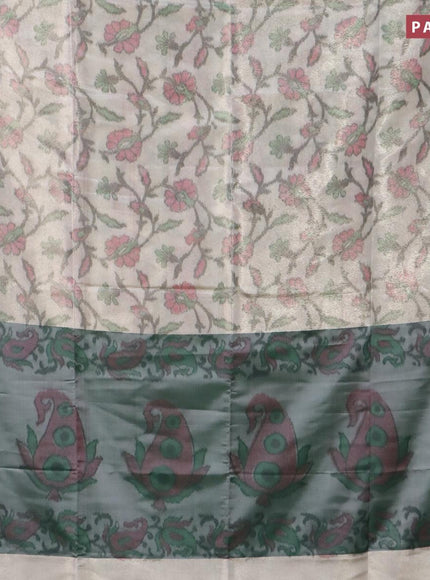 Banarasi semi tussar saree pastel grey and green with allover ikat weaves and copper zari woven border