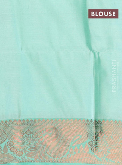 Banarasi semi tussar saree pastel grey and teal green with allover ikat weaves and copper zari woven border