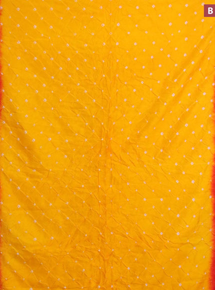 Bandhani saree mango yellow and red with allover bandhani prints and banarasi style border