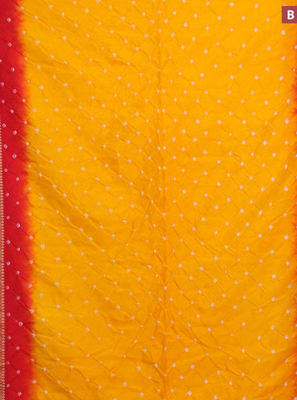 Bandhani saree mango yellow and red with allover bandhani prints and banarasi style border