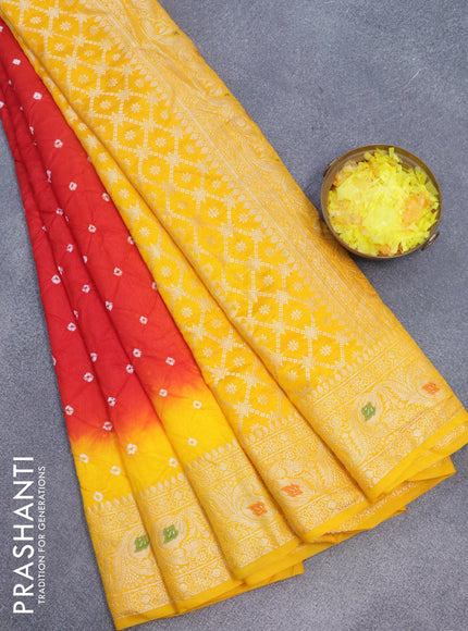 Bandhani saree red and mango yellow with allover bandhani prints and banarasi style border