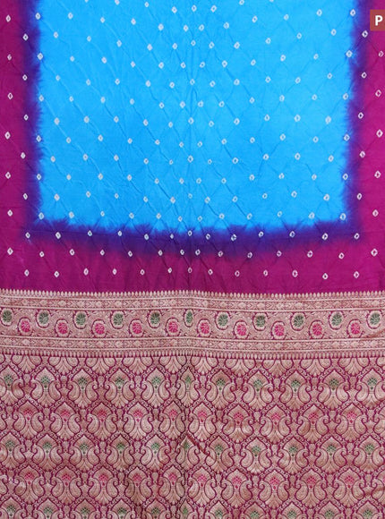 Bandhani saree cs blue and purple with allover bandhani prints and banarasi style border