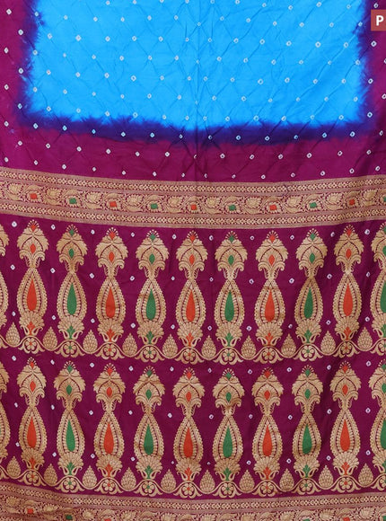 Bandhani saree light blue and purple with allover bandhani prints and banarasi style border