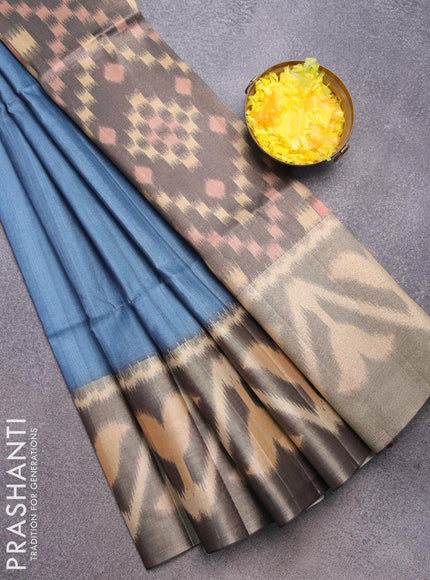 Semi matka saree blue shade and black with plain body and ikat style border