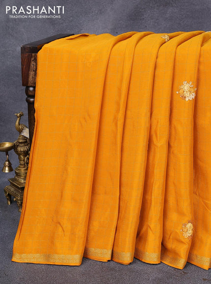 Semi crepe saree mustard yellow with allover zari checked pattern & embroidery work buttas and small zari woven border