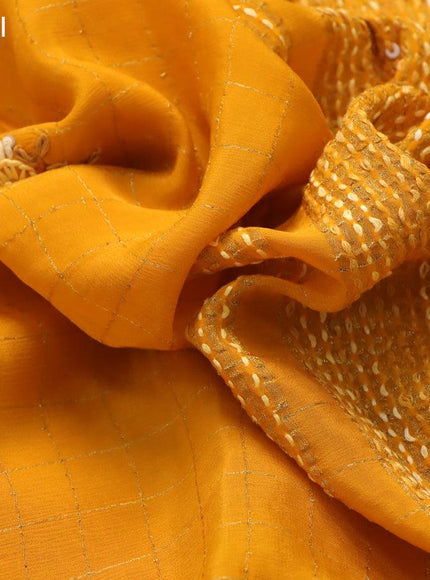 Semi crepe saree mustard yellow with allover zari checked pattern & embroidery work buttas and small zari woven border