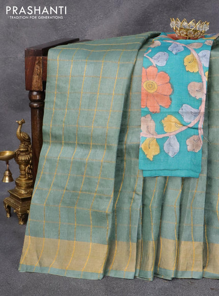 Pure tussar silk saree greyish green and teal blue with allover zari checked pattern and zari woven border and Kalamkari printed blouse