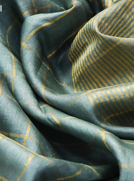 Pure tussar silk saree greyish green and teal blue with allover zari checked pattern and zari woven border and Kalamkari printed blouse