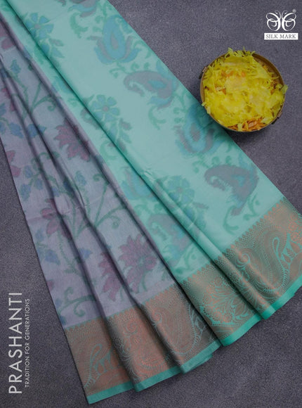 Banarasi semi tussar saree dual shade of grey and teal green with allover ikat weaves and copper zari woven border