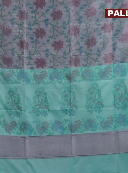 Banarasi semi tussar saree dual shade of grey and teal green with allover ikat weaves and copper zari woven border