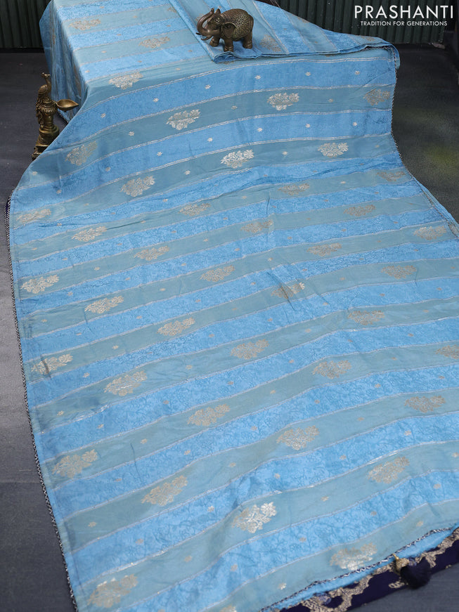 Banarasi semi silk saree pastel blue and navy blue with allover self emboss & zari weaves and beaded work border