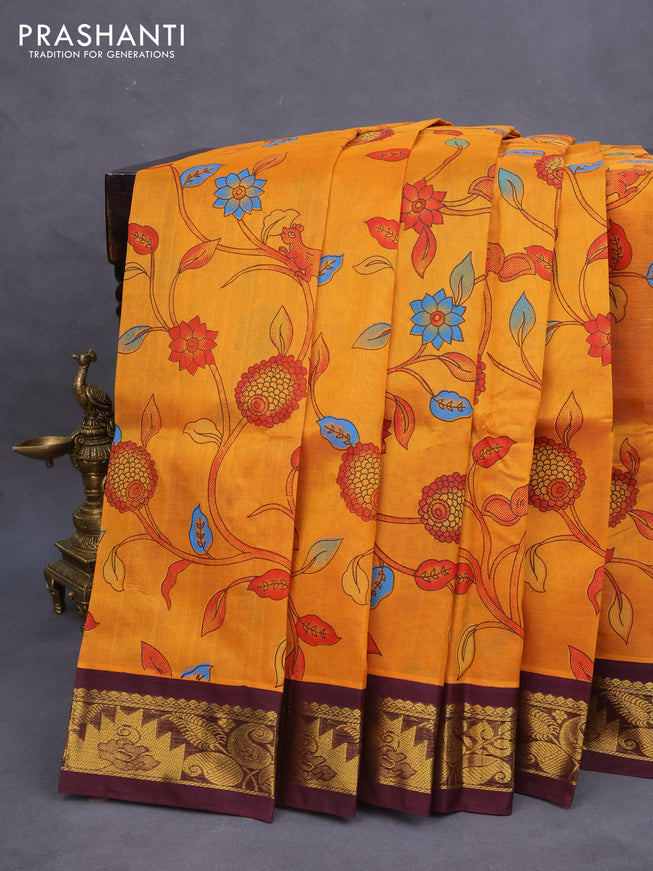 Silk cotton saree mustard yellow and coffee brown with allover kalamkari prints and zari woven korvai border