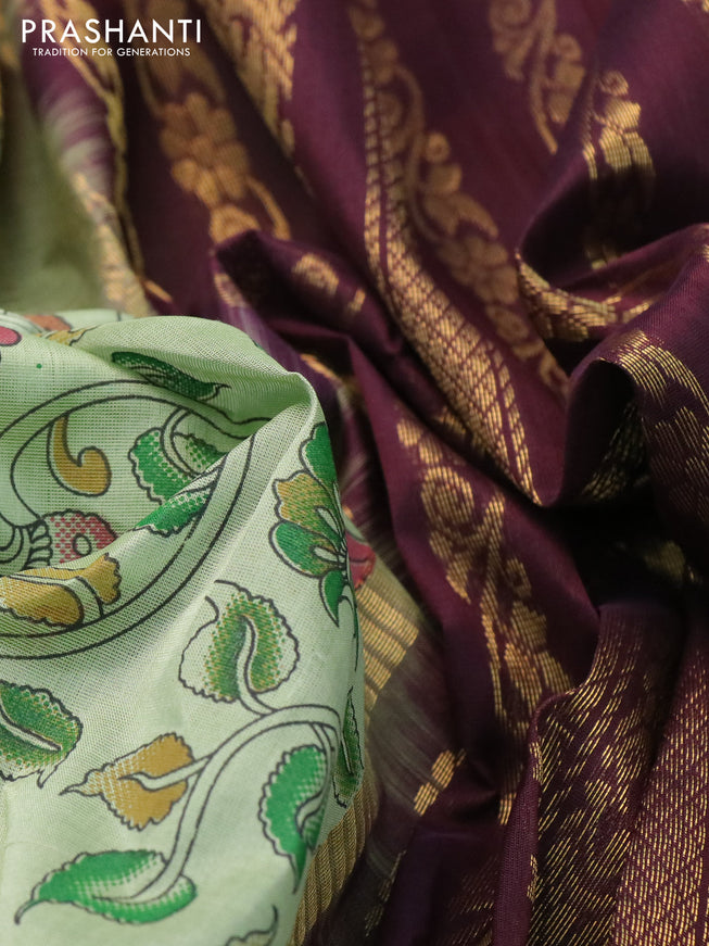 Silk cotton saree pastel green and wine shade with allover kalamkari prints and rettapet zari woven border