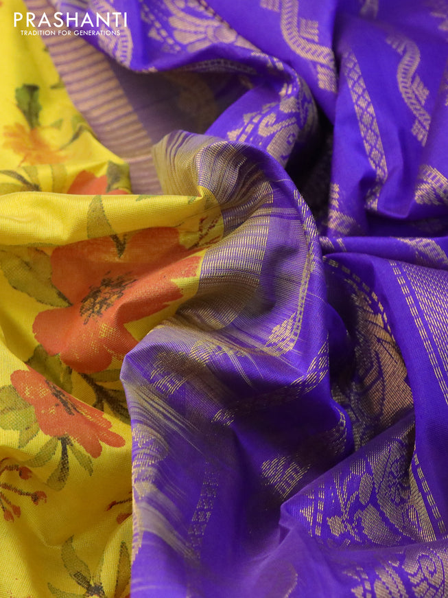 Silk cotton saree yellow and violet with allover kalamkari prints and rettapet zari woven border