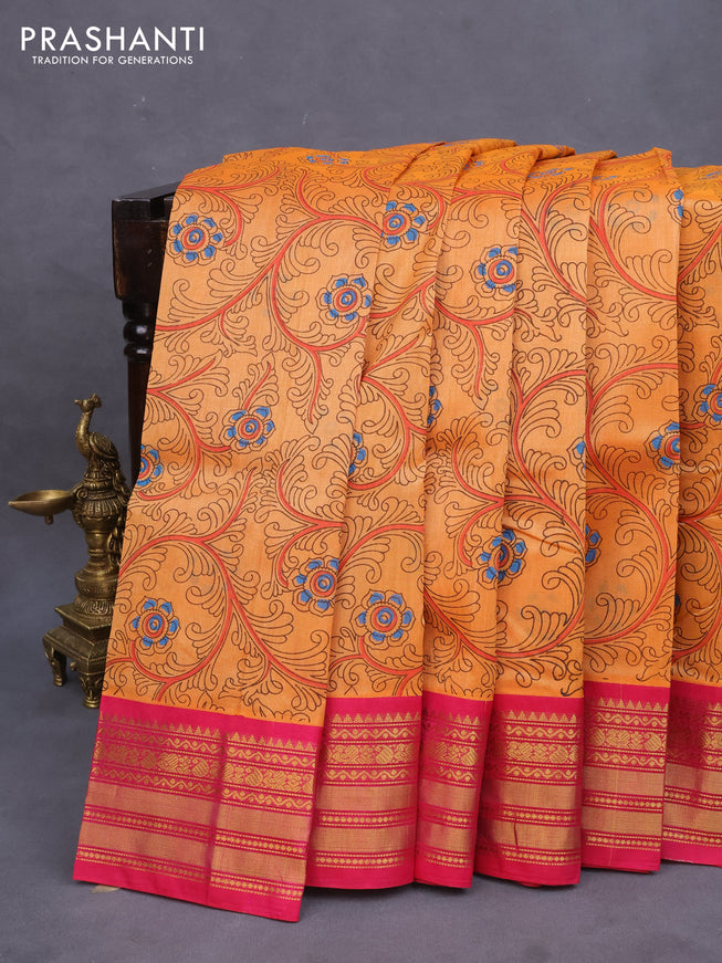 Silk cotton saree orange and pink with allover kalamkari prints and zari woven border