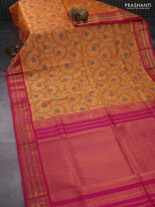 Silk cotton saree orange and pink with allover kalamkari prints and zari woven border