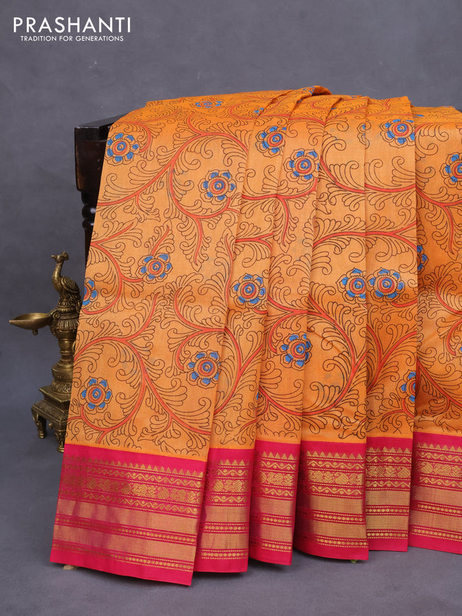 Silk cotton saree orange and pink with allover kalamkari prints and zari woven border