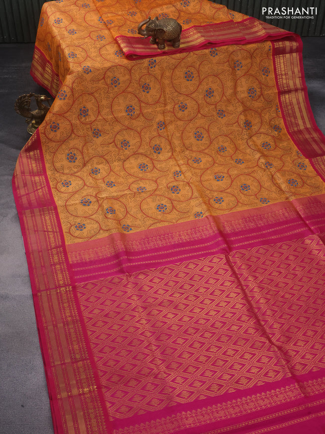 Silk cotton saree orange and pink with allover kalamkari prints and zari woven border